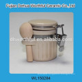 White ceramic tea canister with cover